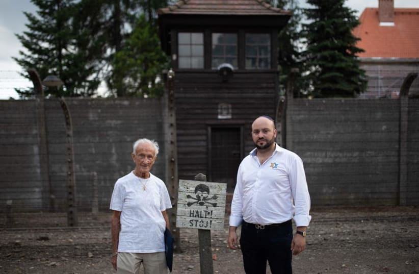  Holocaust survivor Edward Mosberg and From the Depths founder Jonny Daniels stand outside Auschwitz Concentration Camp. (photo credit: FROM THE DEPTHS)