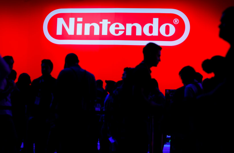 A display for the gaming company Nintendo is shown during opening day of E3, the annual video games expo revealing the latest in gaming software and hardware in Los Angeles (photo credit: MIKE BLAKE/ REUTERS)