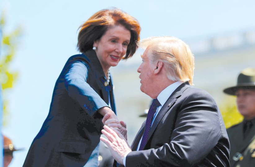 US PRESIDENT Donald Trump and Speaker of the House Nancy Pelosi attend the annual National Peace Officers Memorial Service, on Capitol Hill in Washington on May 15. (photo credit: REUTERS/CARLOS BARRIA)