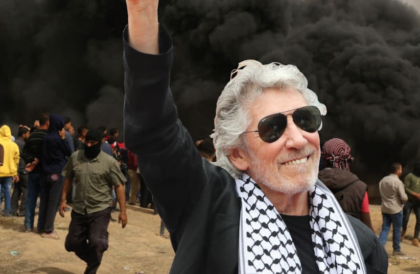 Roger Waters, draped with a Palestinian keffiyeh (photo credit: REUTERS)