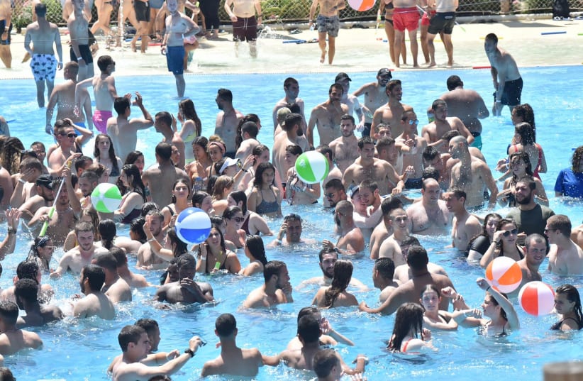 IDF soldiers cool off in a pool at the annual 'Fun Day'  (photo credit: CLICK PHOTOGRAPHY)