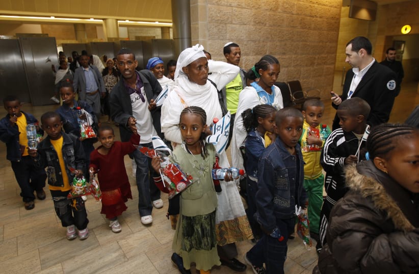 Jewish immigrants from Ethiopia arrive at Ben Gurion International Airport near Tel Aviv in 2011 (photo credit: REUTERS)