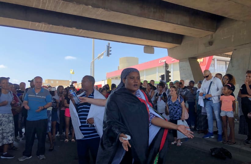 Ethiopian Israelis protest in Haifa on Monday (photo credit: SHAKED KARABELNICOFF)