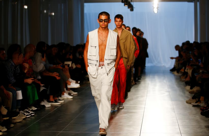 Models present creations at the Qasimi show at London Fashion Week Men's, in London (photo credit: HENRY NICHOLLS/REUTERS)