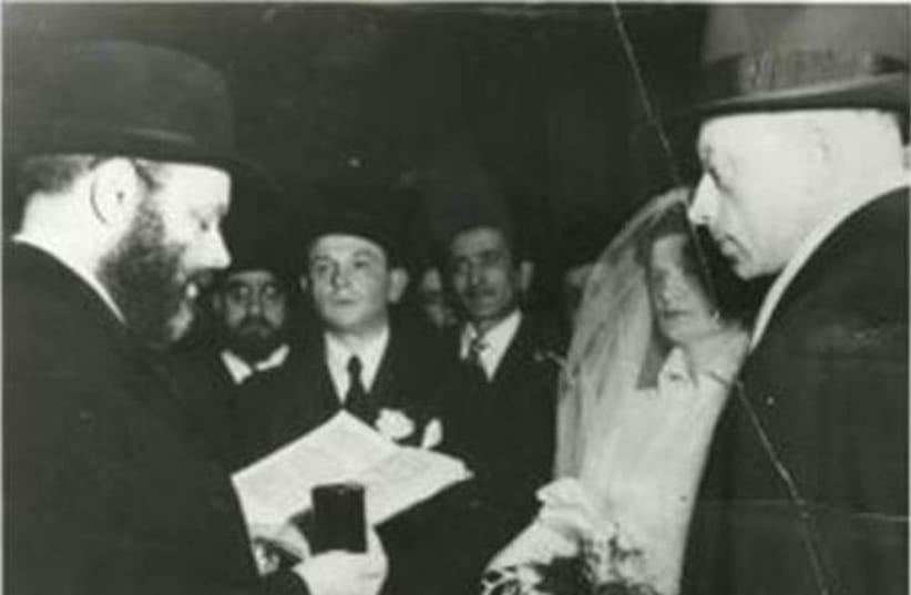 Rabbi Menachem Mendel Schneerson officiates at a wedding ceremony, New York, 1951 (photo credit: Courtesy)