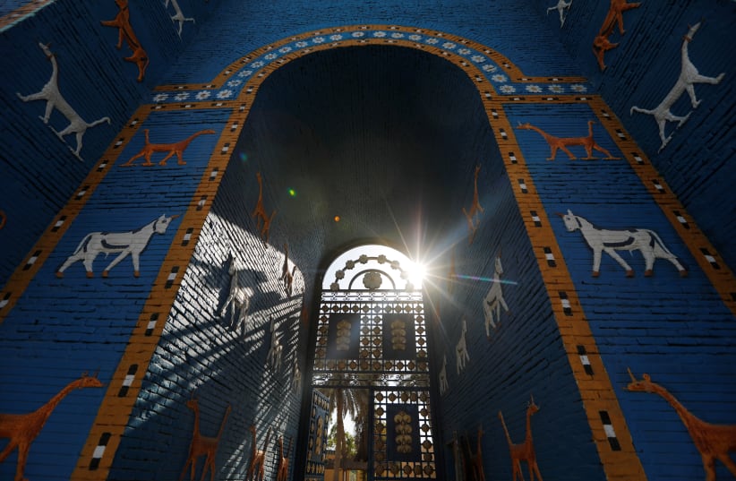 A general view shows a replica of Ishtar gate at the ancient city of Babylon near Hilla, Iraq July 5, 2019.  (photo credit: THAIER AL-SUDANI/REUTERS)