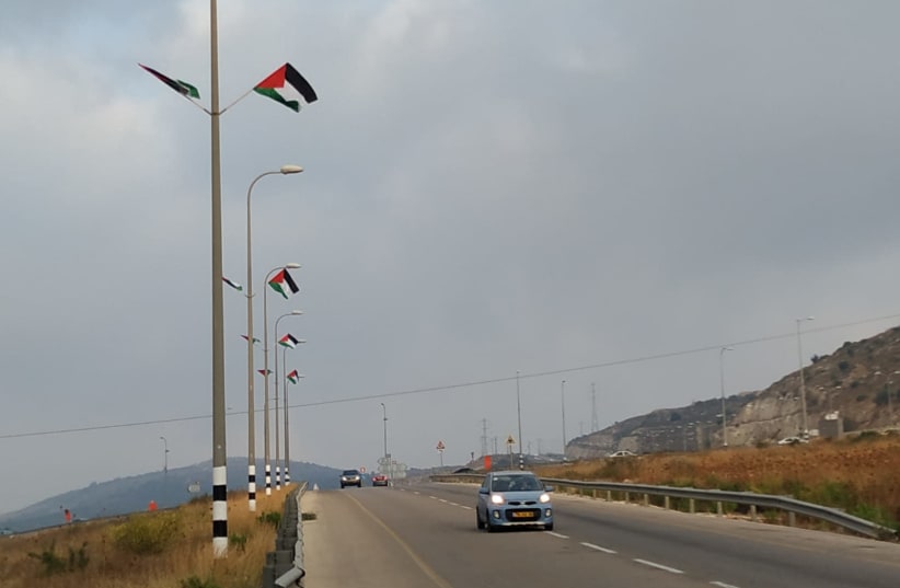 Palestinian flags hung by the roads across the West Bank (photo credit: TPS)