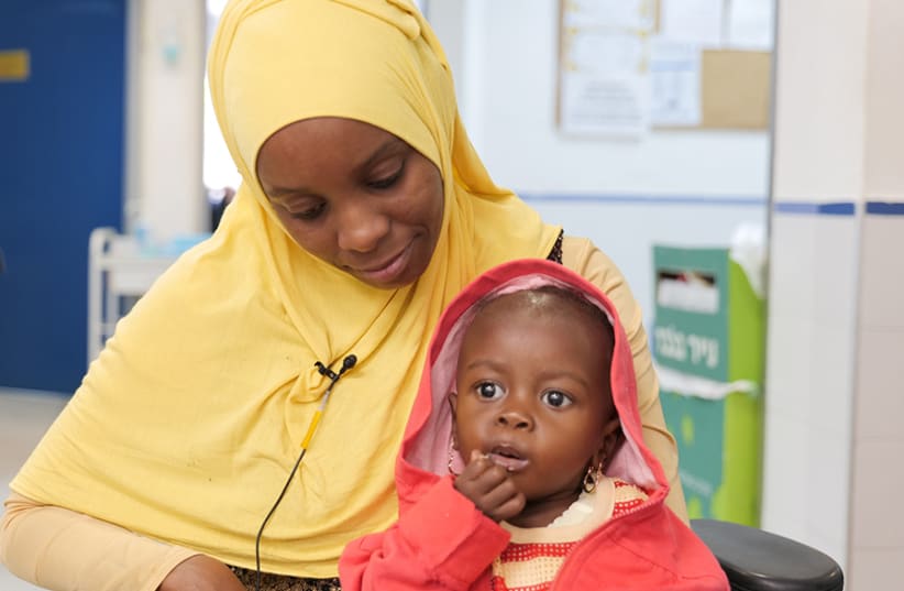 Balkis and her daughter, Fatma, from Tanzania (photo credit: SACH)