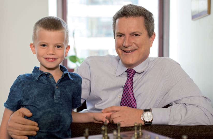 Chess for Change founder David Berman with his son, Nate (photo credit: Courtesy)