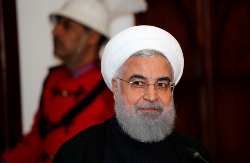 Iranian President Hassan Rouhani speaks during a news conference  at Salam Palace in Baghdad, Iraq March 11, 2019 (photo credit: THAIER AL-SUDANI/REUTERS)