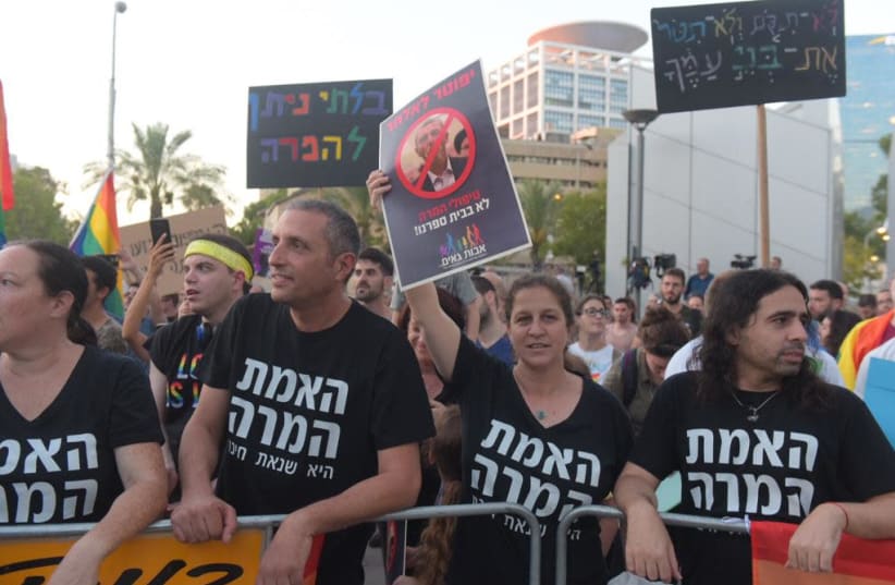 Thousands protest throughout the country after Education Minister Rafi Peretz stated that he supports gay conversion therapy. (photo credit: AVSHALOM SASSONI)