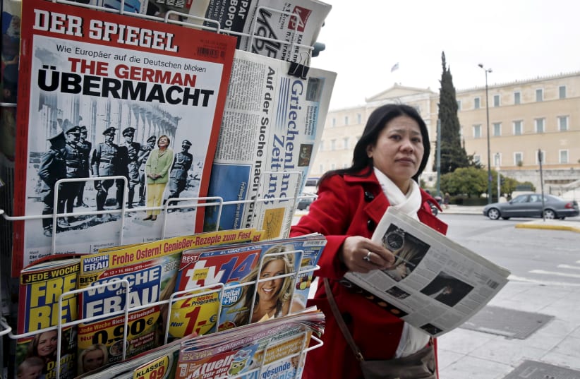 The German magazine Der Spiegel, at a newsstand, in Athens (photo credit: ALKIS KONSTANTINIDIS / REUTERS)
