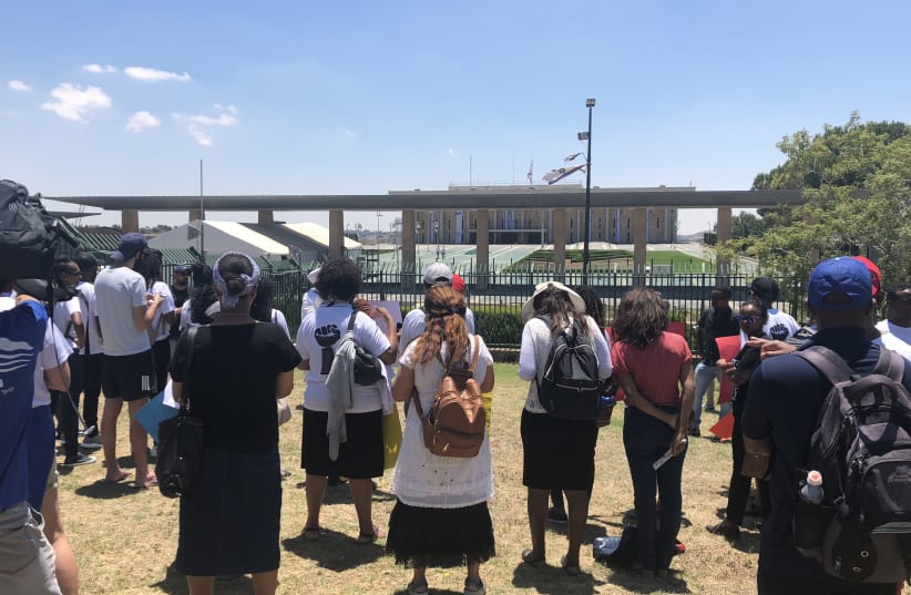 Ethiopian-Israelis protest outside Knesset July 15, 2019 (photo credit: BRADLEY LEVIN)