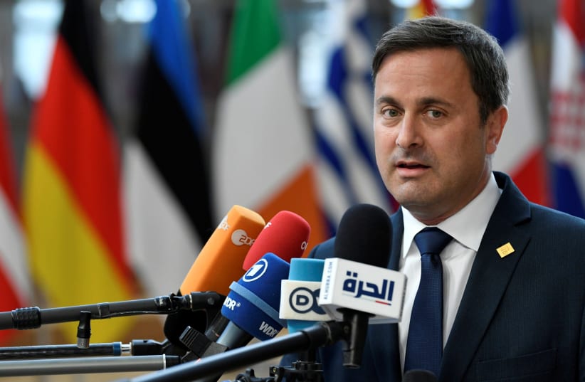 Luxembourg's Prime Minister Xavier Bettel speaks to media in Brussels, Belgium July 2, 2019 (photo credit: REUTERS)