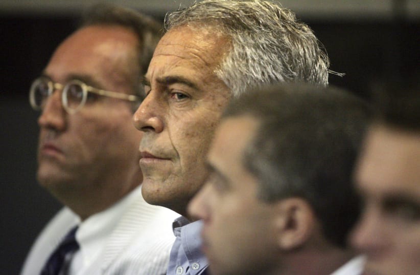 U.S. financier Jeffrey Epstein (C) appears in court where he pleaded guilty to two prostitution charges in West Palm Beach, Florida, U.S. July 30, 2008. Picture taken July 30, 2008.   (photo credit: UMA SANGHVI/PALM BEACH POST VIA REUTERS)