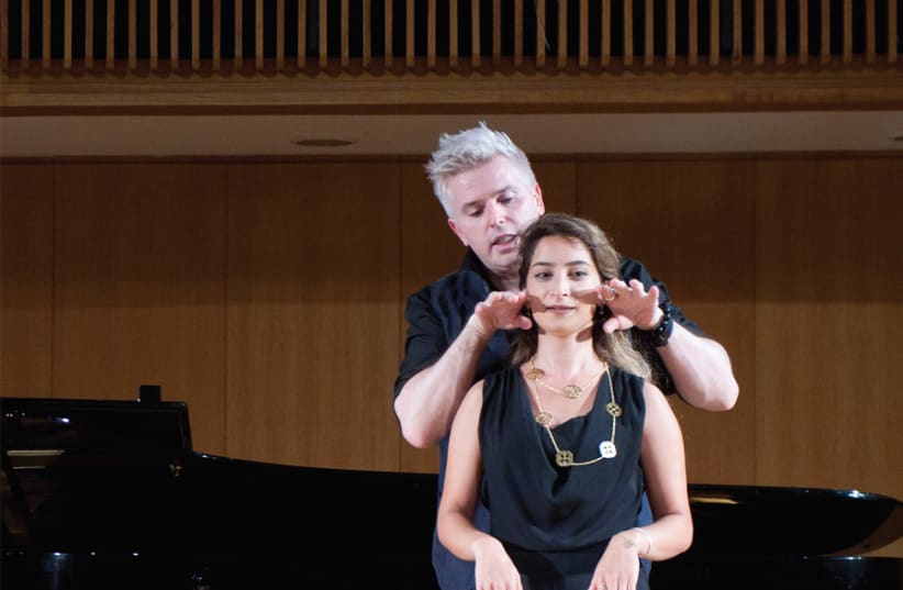 DAN ETTINGER guides a student of opera at a master class. (photo credit: MAXIM REIDER)