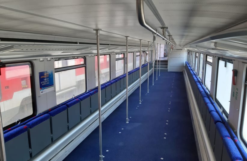 A converted Israel Railways carriage enabling standing-only travel at rush hour  (photo credit: ISRAEL RAILWAYS)