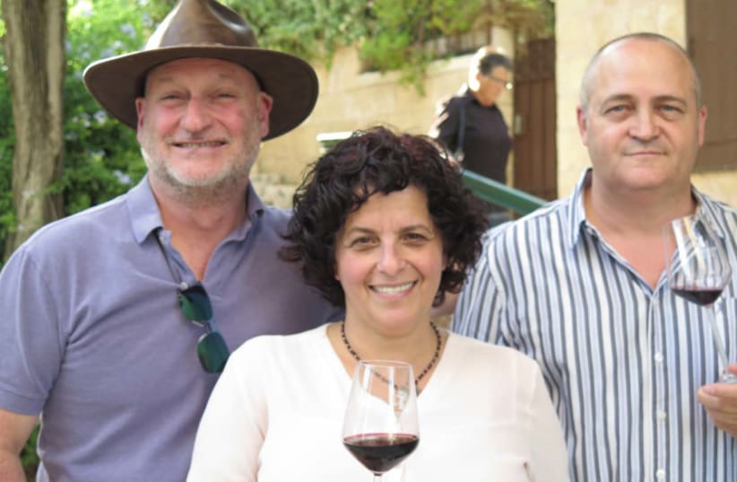 THE JERUSALEM Wineries dream team: (from left) winemaker Sam Soroka, marketing manager Carmit Ehrenreich and CEO Erez Winner. (photo credit: SARA DAVIDOVITCH)