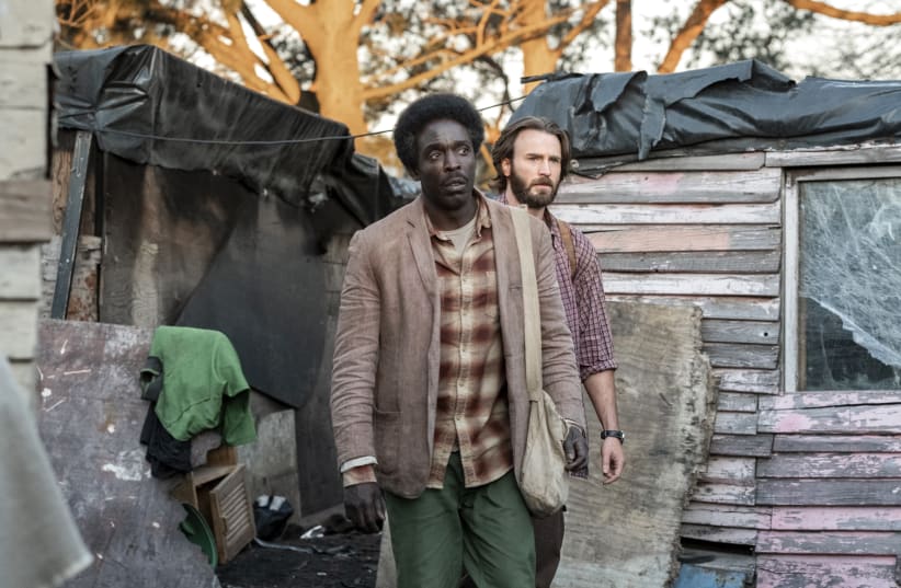 Michael Kenneth Williams (left) and Chris Evans star in The Red Sea Diving Resort (photo credit: NETFLIX/MARCOS CRUZ)