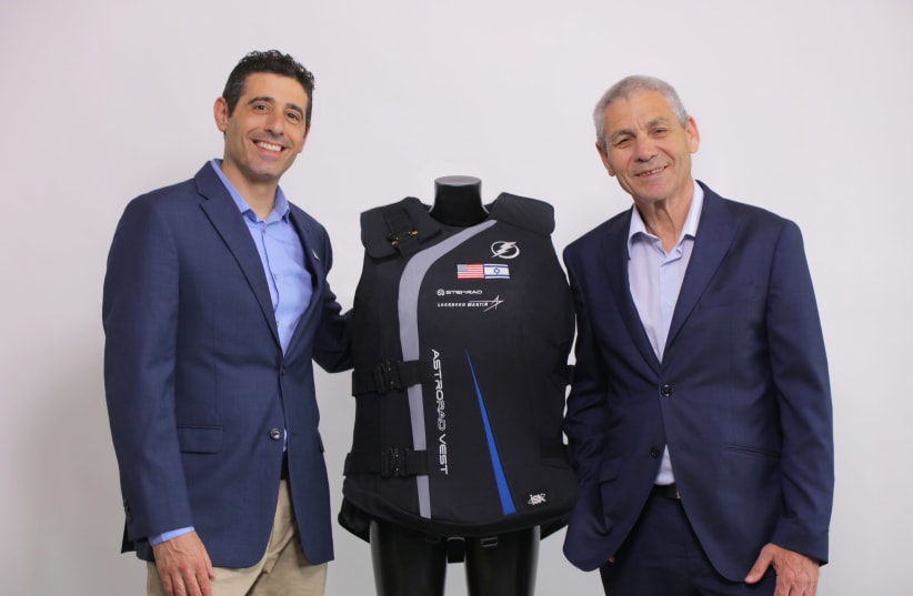 StemRad CEO Dr. Oren Milstein (L) and Israel Space Agency director-general Avi Blasberger with the AstroRad radiation protection vest (photo credit: STEMRAD)