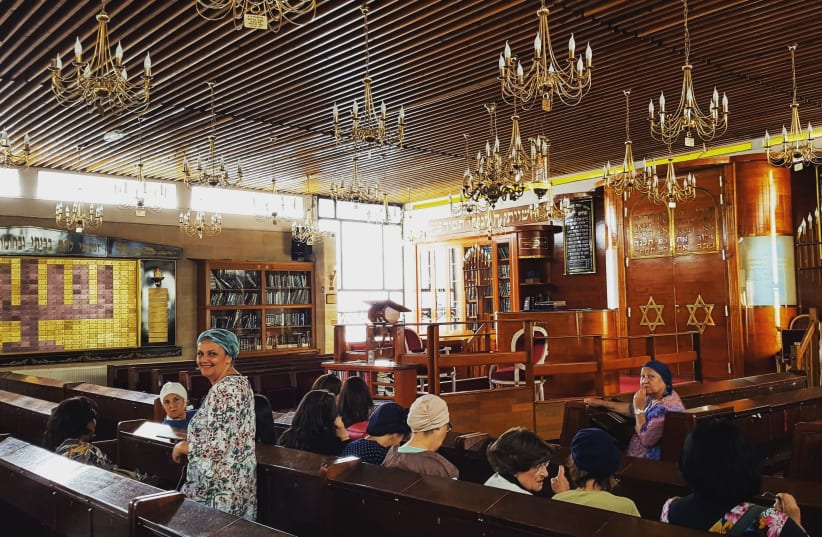 Jewish women in Sarcelles main synagogue complex wait to take part in a shiur. (photo credit: ILANIT CHERNICK)