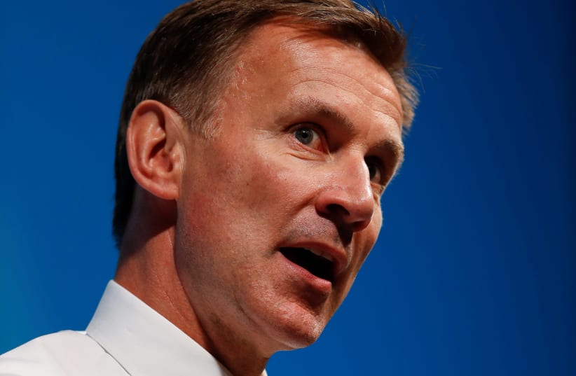 Jeremy Hunt gestures as he attends a event in Cheltenham, Britain July 12, 2019 (photo credit: REUTERS)