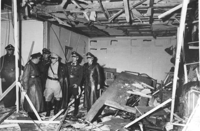 Herman Goring and Martin Bormann visit the destroyed barracks in the Führer's headquarters "Wolf's Lair" near Rastenburg, East Prussia, July 1944 (photo credit: GERMAN FEDERAL ARCHIVE/WIKIMEDIA COMMONS)