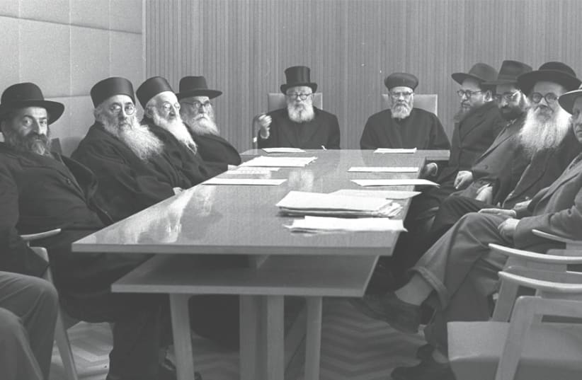 ISRAEL’S CHIEF Rabbinate Council, 1959. At its helm sit Ashkenazi chief Rabbi Yitzhak HaLevi Herzog (center, at left) and Sephardi chief Rabbi Yitzhak Nissim (at right). (photo credit: Wikimedia Commons)