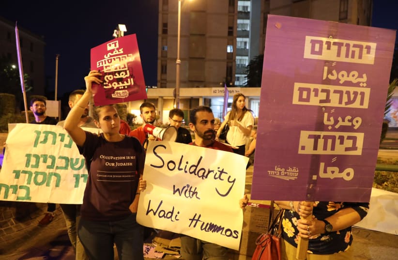People demonstrate outside the Prime Minister's Residenceagainst the decision to destroy illegal Palestinian homes in Wadi Hummus, July 25, 2019  (photo credit: MARC ISRAEL SELLEM/THE JERUSALEM POST)