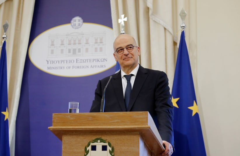Newly appointed Greek Minister of Foreign Affairs Nikos Dendias attends a handover ceremony in Athens, Greece, July 9, 2019 (photo credit: ELPIDA KAFANTARI/REUTERS)