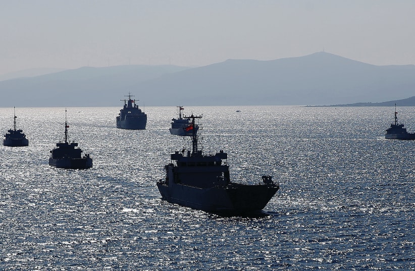 TURKISH NAVY ships take part in a landing drill off the Aegean coastal town of Foca in Izmir Bay in March. (photo credit: MURAD SEZER/REUTERS)
