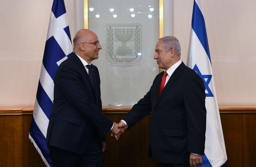 Prime Minister Benjamin Netanyahu meets with Greek Foreign Minister Nikos Dendias at the Prime Minister's Office in Jerusalem (photo credit: KOBI GIDEON/GPO)