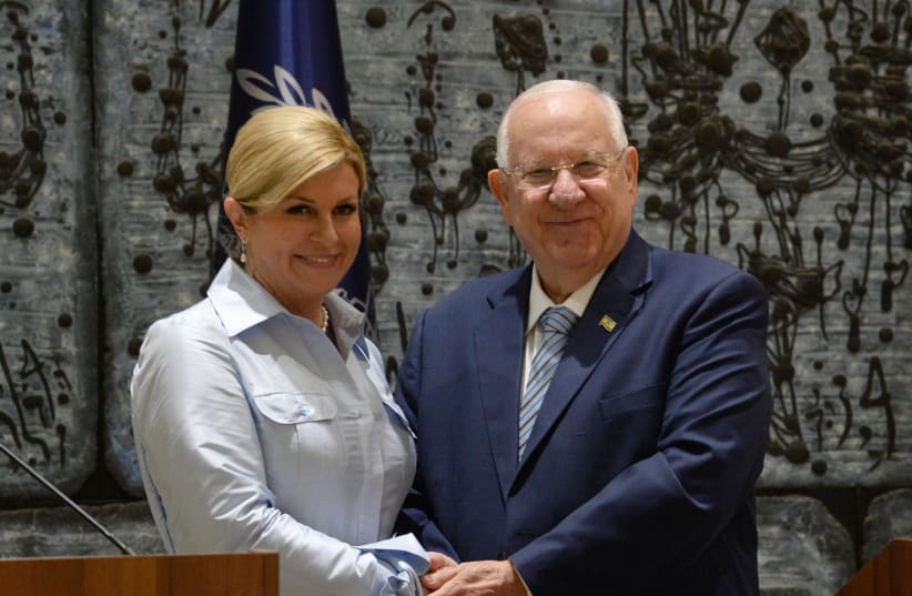 President Reuven Rivlin held a state reception for Croatian President Kolinda Grabar-Kitarović who visits Israel (photo credit: MARC NEYMAN/GPO)