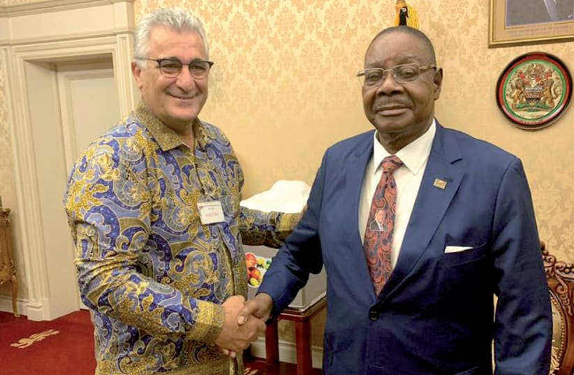 Nir Gess with President Peter Mutharika of Malawi (photo credit: Courtesy)