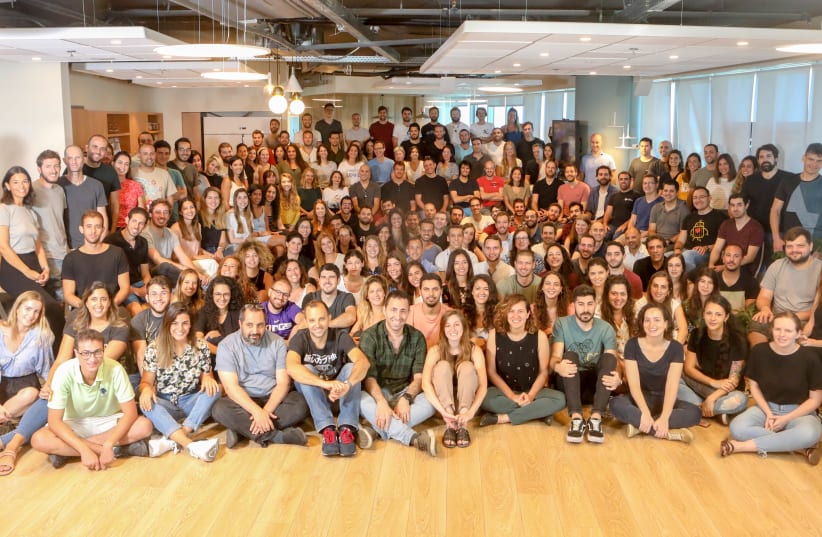 Staff at monday.com's Tel Aviv headquarters (photo credit: SHLOMI YOSEF)