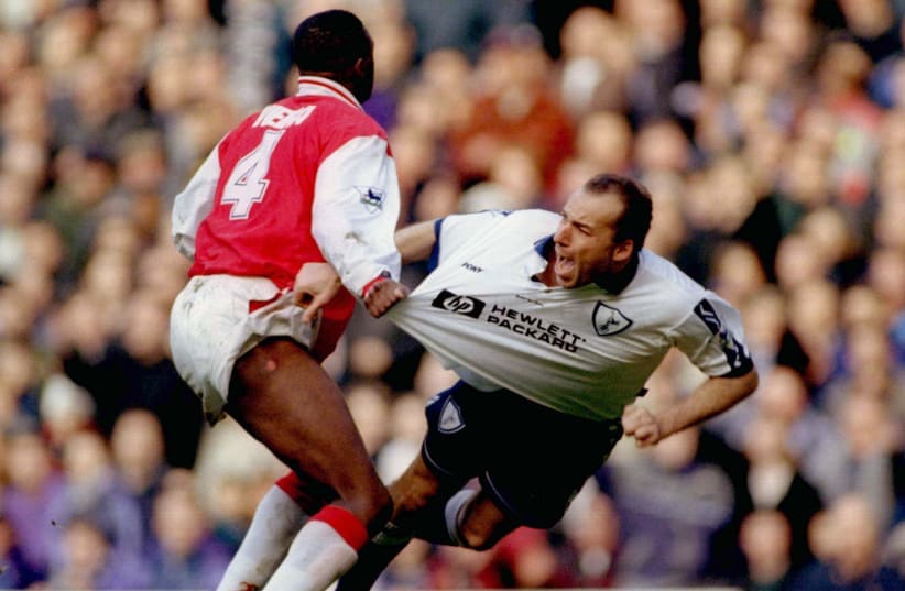 Arsenal's Patrick Vieira (L) fouls Tottenham Hotspurs Ronny Rosenthal (R) during their premiership match at White Hart Lane in 1997 (photo credit: REUTERS)