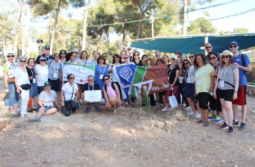 Educators from around the world plant trees in Lavi Forest with KKL-JNF. (photo credit: YOAV DEVIR KKL-JNF)