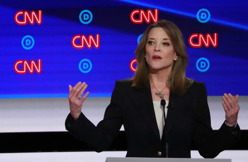 Author Marianne Williamson speaks on the first night of the second 2020 Democratic U.S. presidential debate in Detroit, Michigan, U.S., July 30, 2019 (photo credit: REUTERS)