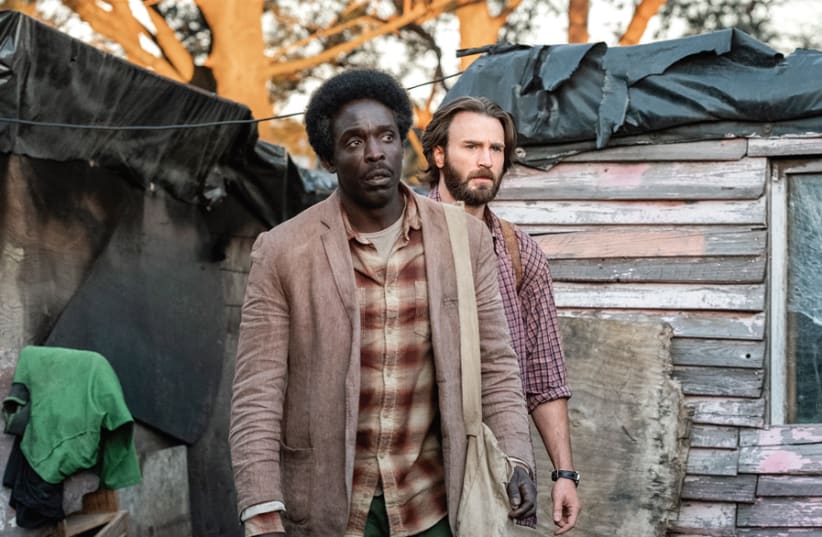 MICHAEL KENNETH Williams (left) and Chris Evans in ‘The Red Sea Diving Resort.’ (photo credit: NETFLIX/MARCOS CRUZ)