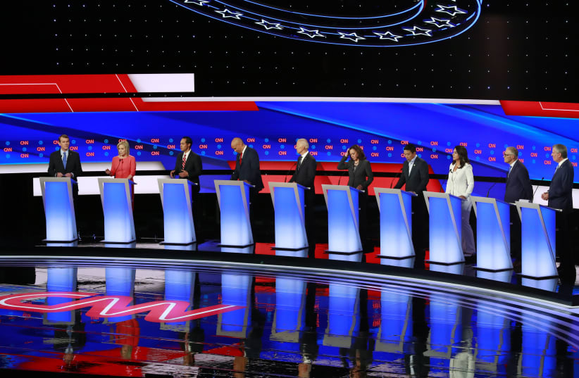 Democratic 2020 U.S. presidential candidates pose together before the start of the second night of the second U.S. 2020 presidential Democratic candidates debate (photo credit: REUTERS)