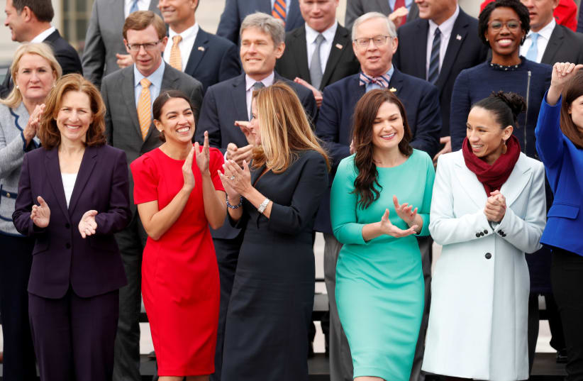 Newly elected members of the U.S. House of Representatives on Capitol Hill in Washington, U.S. (photo credit: REUTERS/KEVIN LAMARQUE)