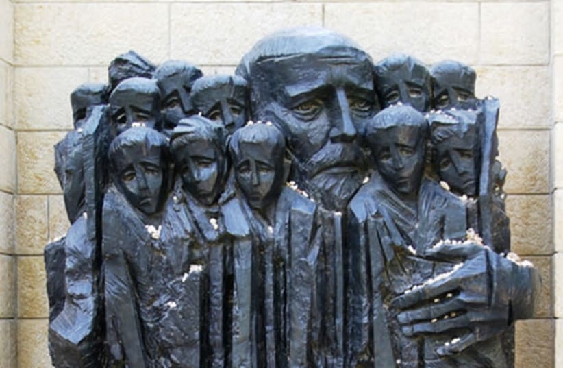 The 'Janusz Korczak and the Children' sculpture by Boris Saktsier (photo credit: YAD VASHEM)