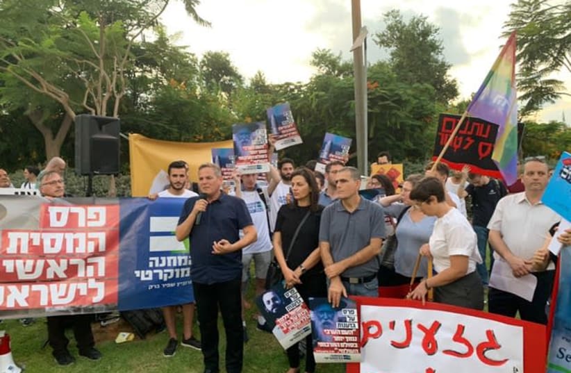 Democratic Union leader MK Nitzan Horowitz speaking against Rabbi Yitzhak Ginsburg in Givat Shmuel. (photo credit: DEMOCRATIC UNION)