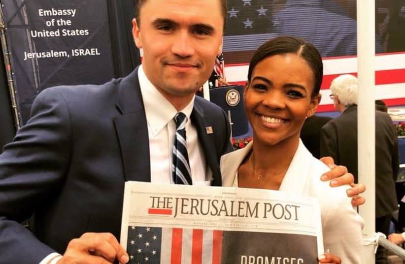 Candace Owens (R) and Charlie Kirk (L) holding a copy of The Jerusalem Post (photo credit: CHARLIE KIRK)