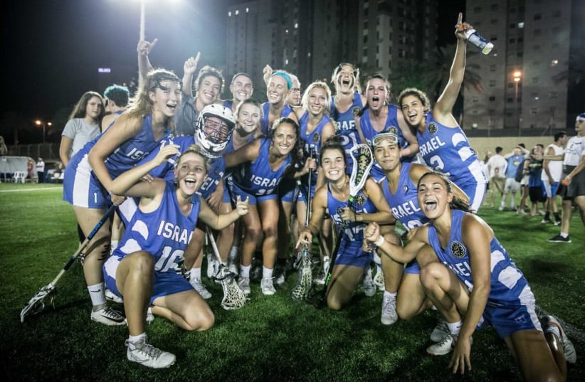 THE ISRAEL WOMEN'S NATIONAL LACROSSE TEAM celebrates after a victory during last month's European Championship, in which the host Israelis captured the silver medal (photo credit: ODED KARNI)