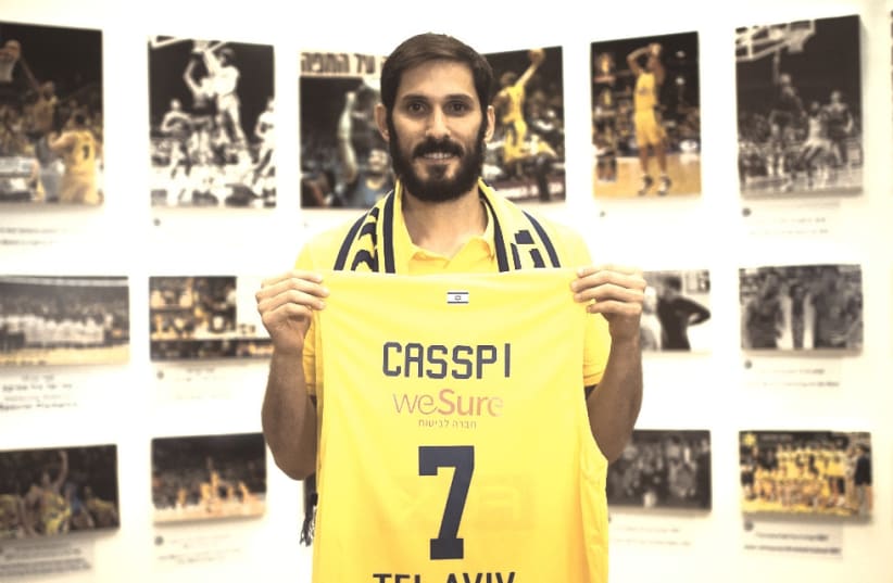 AFTER 10 years in the NBA, Israeli forward Omri Casspi returned to his roots yesterday, signing a three-year deal with Maccabi Tel Aviv, where he began his professional basketball career. (photo credit: MACCABI TEL AVIV/COURTESY)
