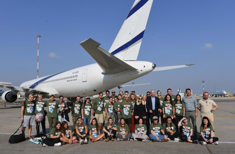 242 new immigrants stepped off a Nefesh B’Nefesh chartered El Al flight in Ben-Gurion Airport on August 14, 2019. (photo credit: GPO)