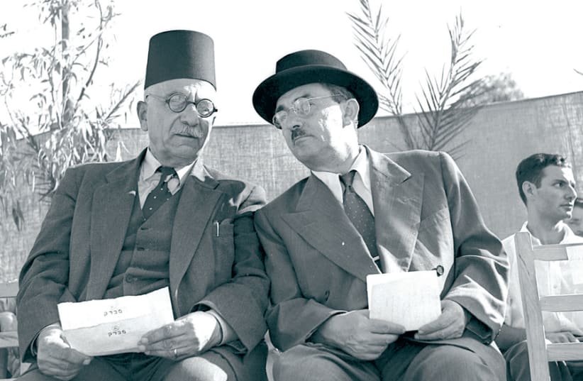 FORMER PRIME minister Moshe Sharett (right) and Israeli-Arab MK Amin-Salim Jarjora. (photo credit: Wikimedia Commons)