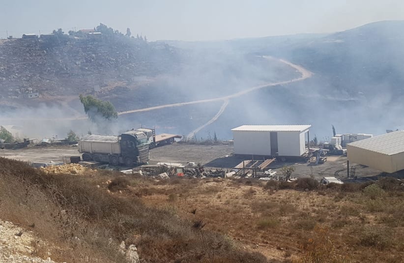 Fire in the West Bank settlement of Yitzhar (photo credit: NATHANAEL KAUFMAN/TPS)