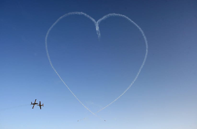  IAF jets draw a heart in the sky at at Hatzerim Air Base. (photo credit: BAZ RATNER/REUTERS)
